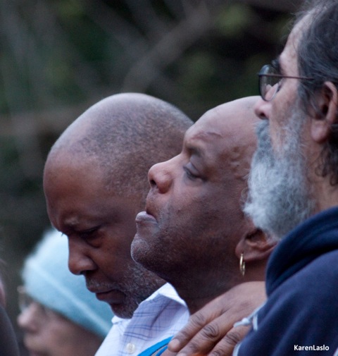 photo by Karen LasloDave Phillips (center) mourns the loss of his son.