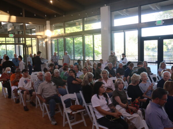 Upset community members clash with solar farm developer